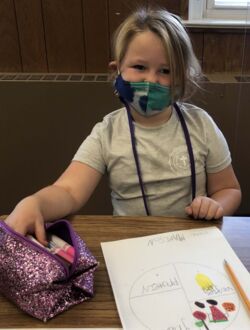 Student with glitter pencil case_Cropped.jpg Thumbnail